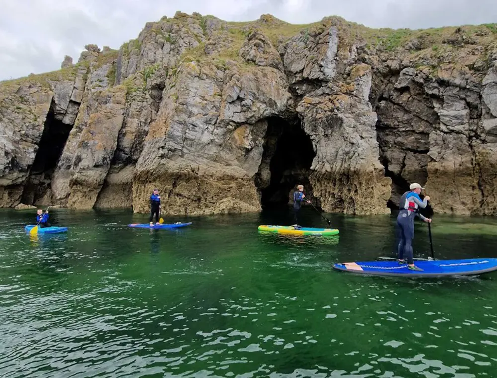 Tenby paddle boarding lessons and guided SUP tours