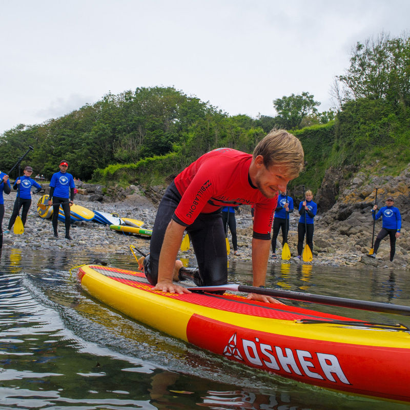 Paddle Boarding at Pembroke Castle In Pembrokeshire