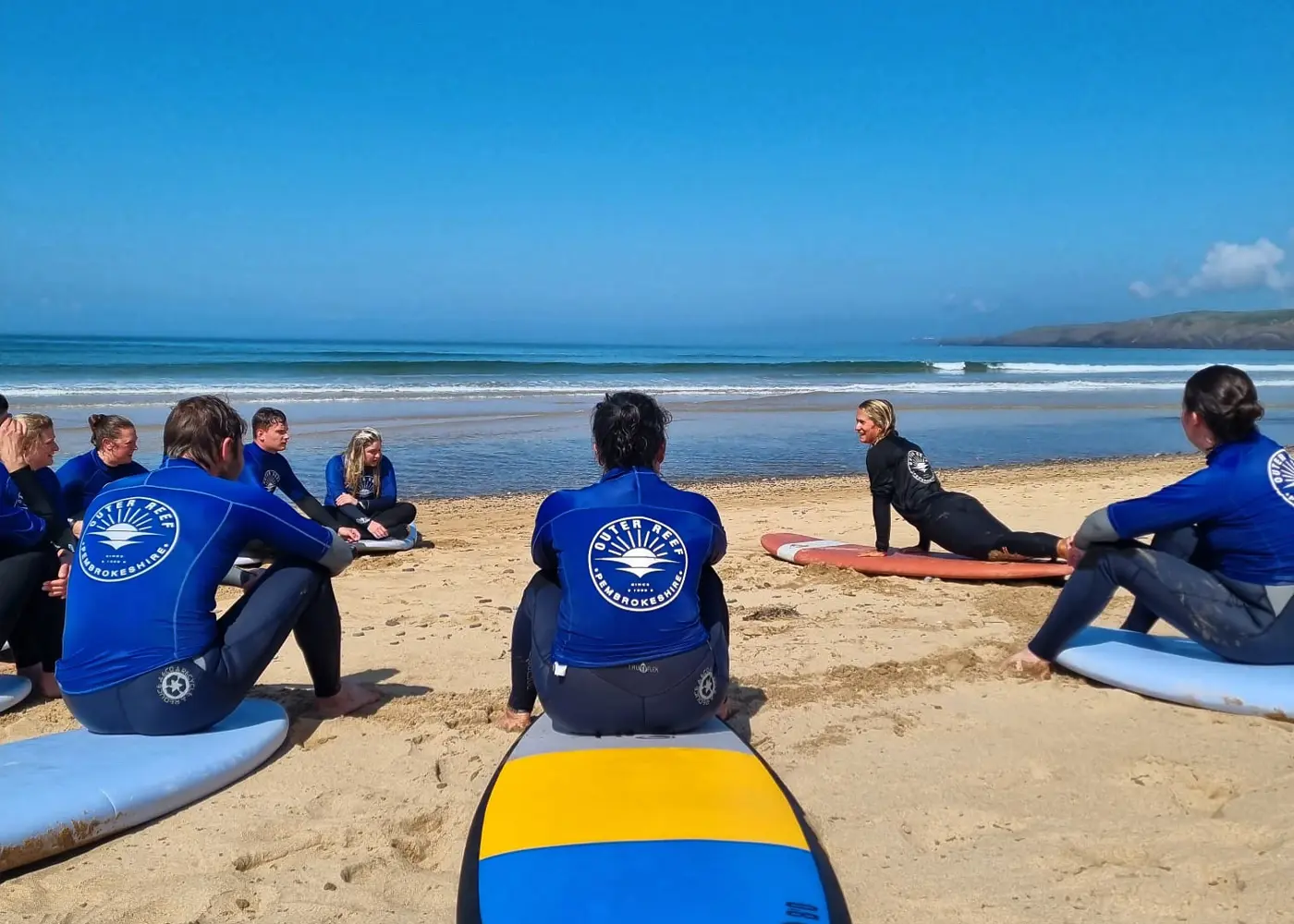 Women surfing on the Salty Sisters France retreat