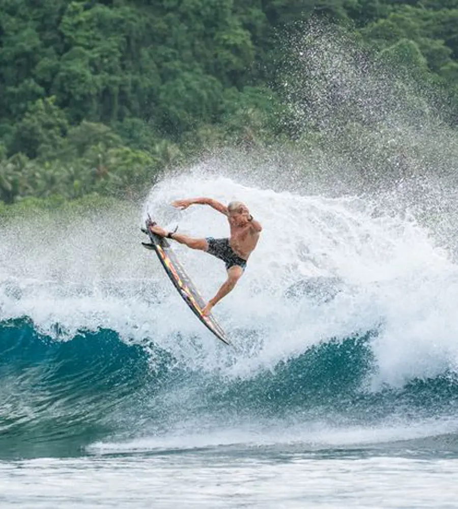 Surfing action representing Surf School Alliance instructor development and surf education