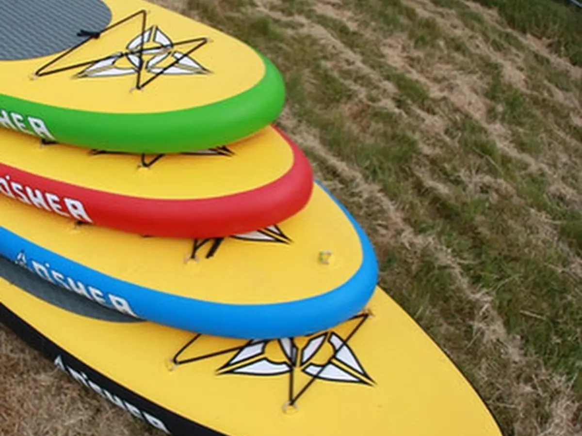 Inflatable paddle boards ready for hire