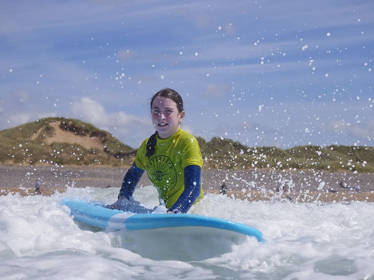 Surf Camp Camper Riding A Wave In Pembrokeshire
