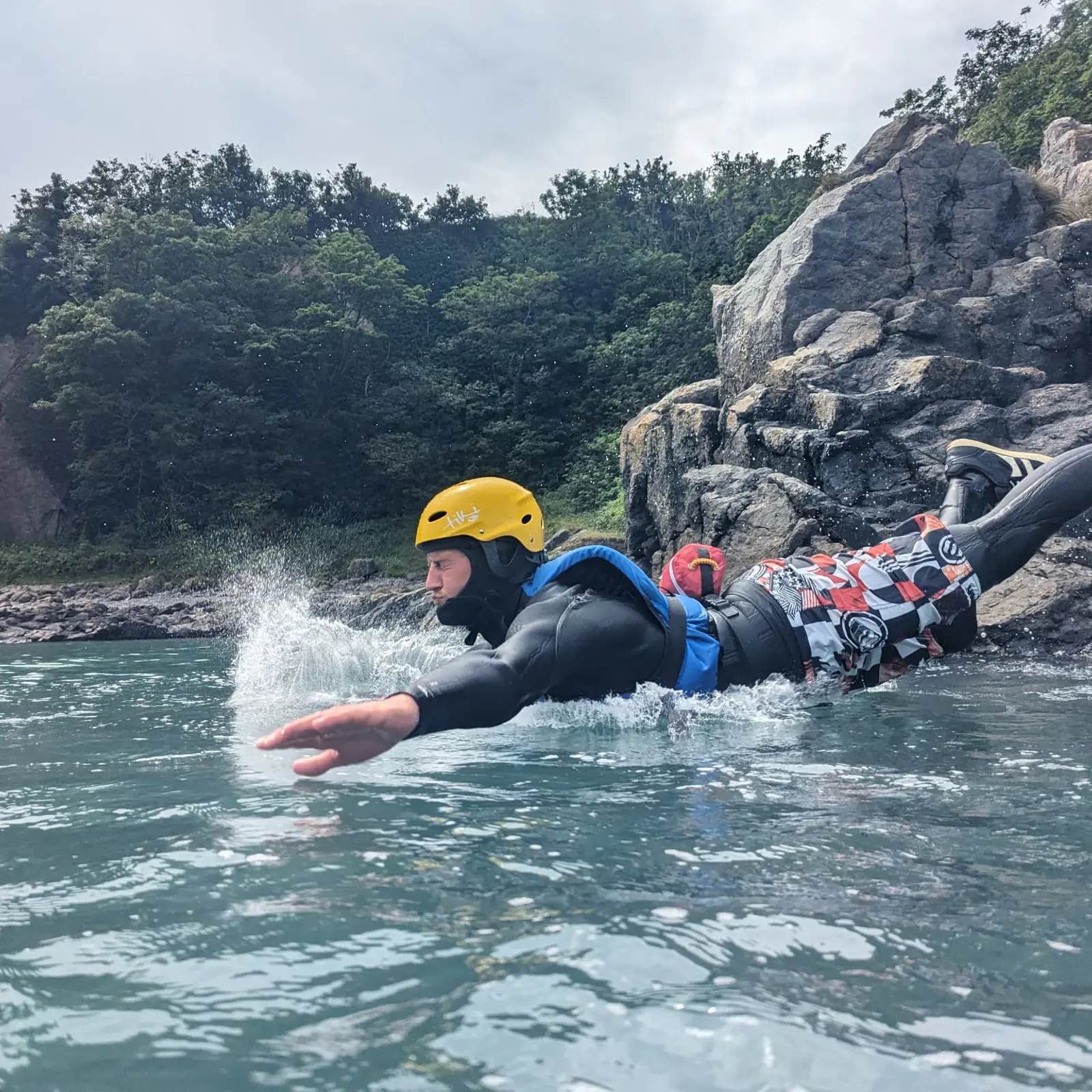 Family outdoor adventure and coasteering in West Wales