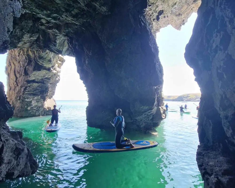 Paddle boarding at Stackpole Quay Pembrokeshire