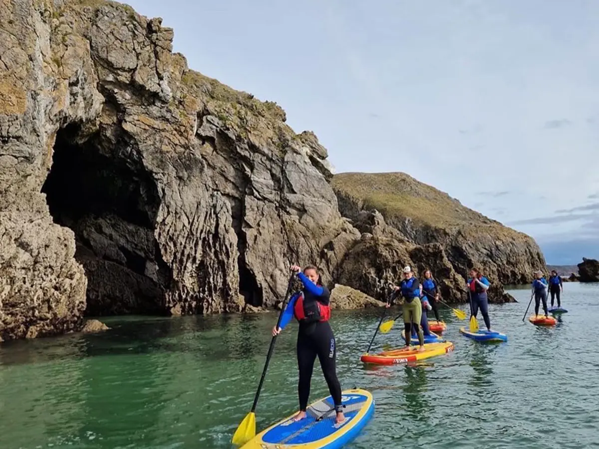 Paddle boarding along the Pembrokeshire coastline