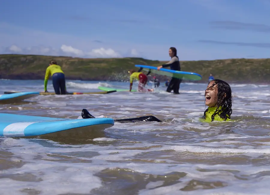 Beginner surf lesson pop up practice in Pembrokeshire