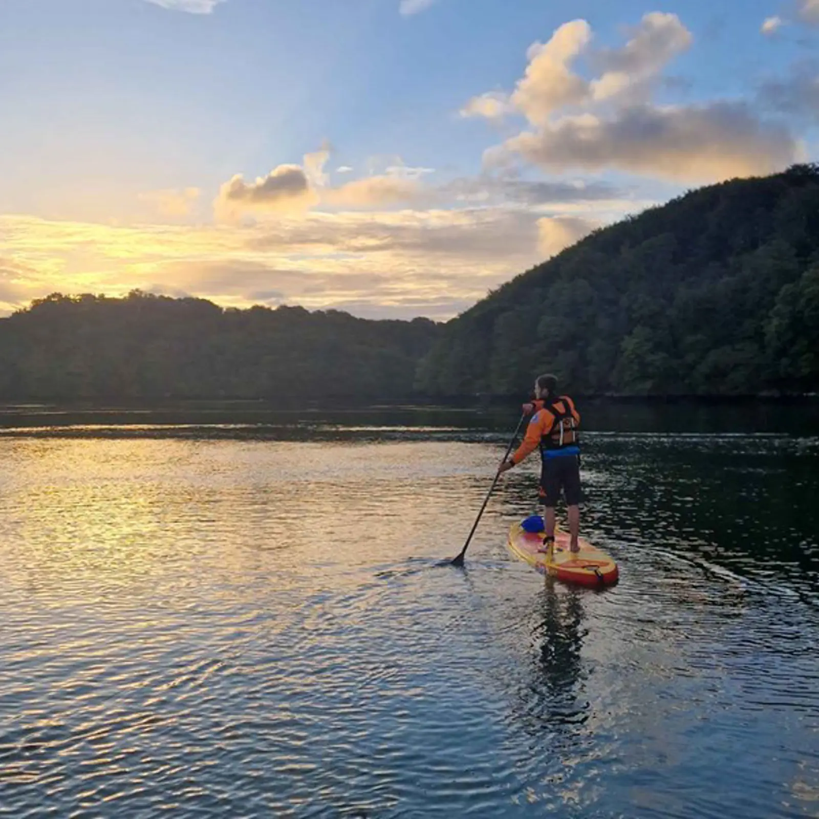 Group paddleboarding retreat in Wales